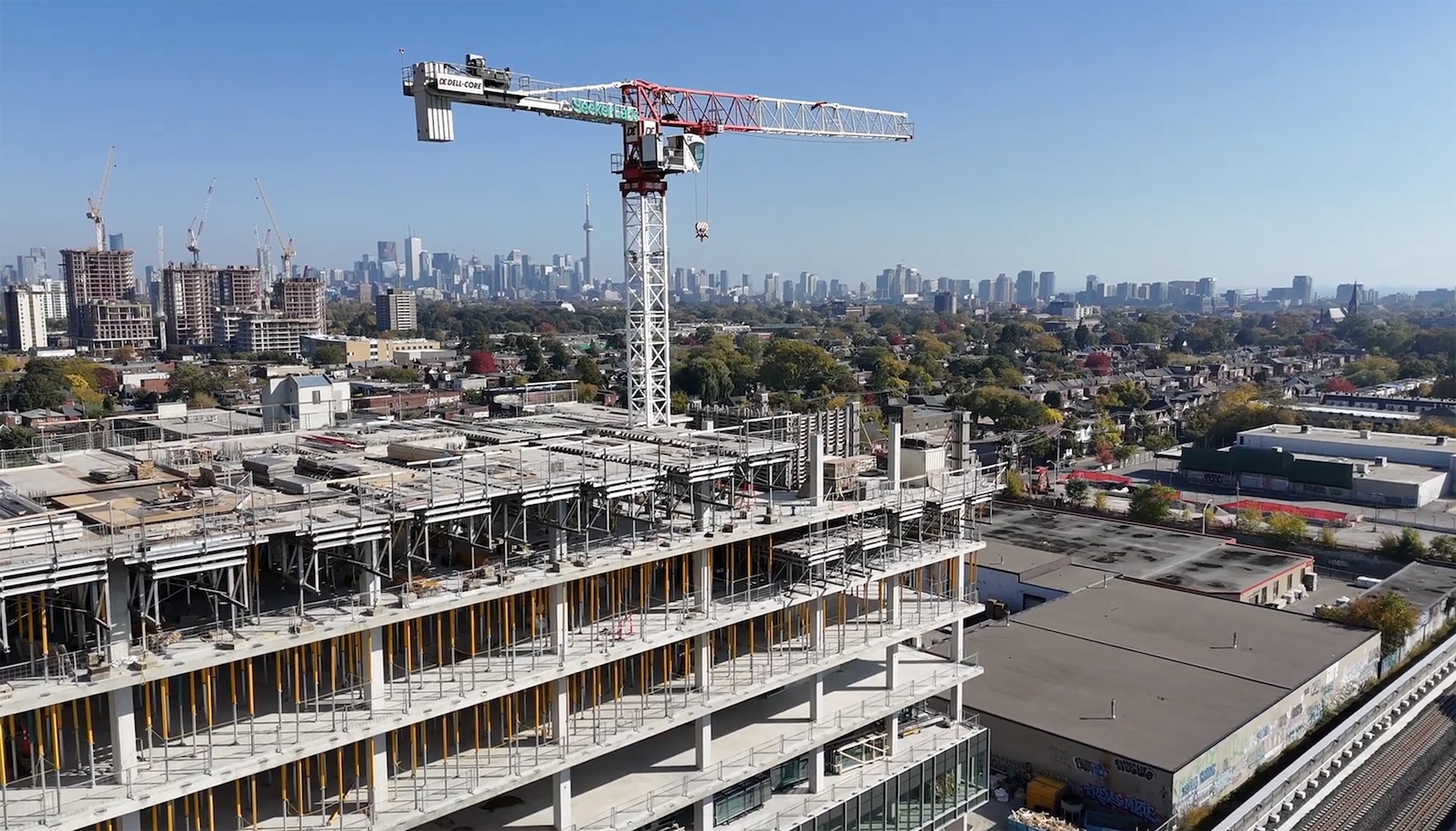 Catalyst construction site with tower crane and Toronto skyline in the background